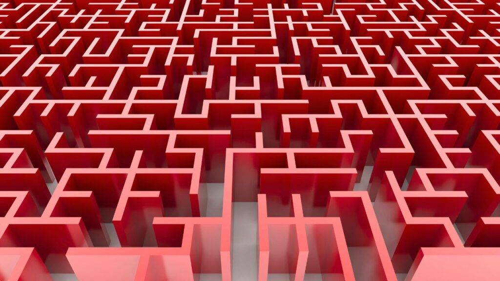 A red maze symbolizing the complexity of obtaining an adverse credit mortgage in the UK, and the journey toward homeownership