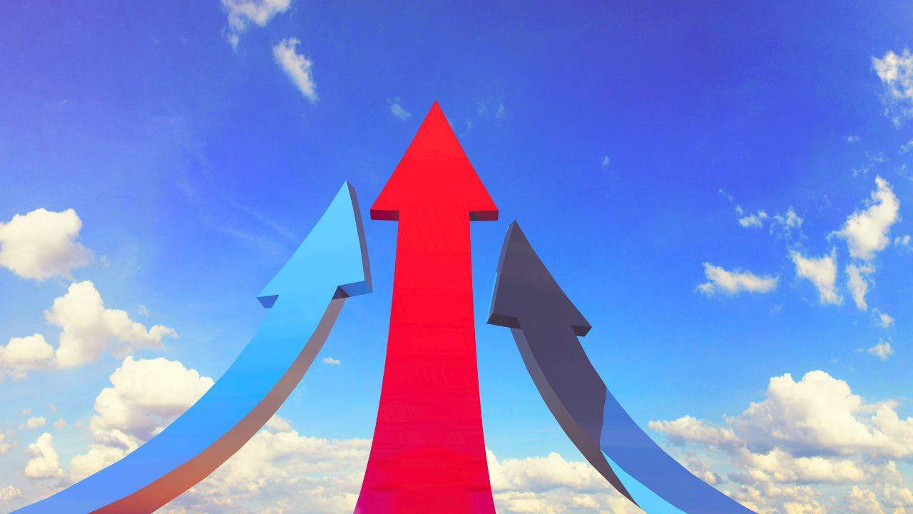 Three upward arrows, symbolizing strategies to quickly boost your credit card limit and improve financial standing