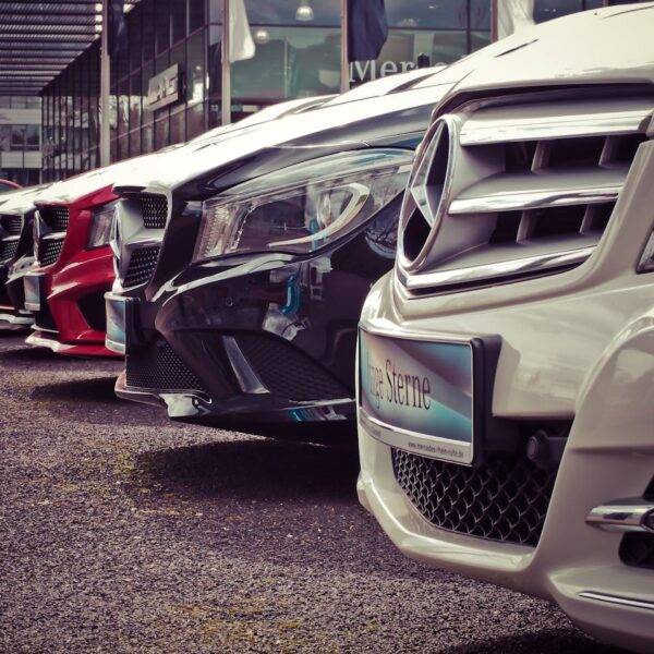 Row of used cars at a dealership, representing the UK used car market from 2010 to 2024