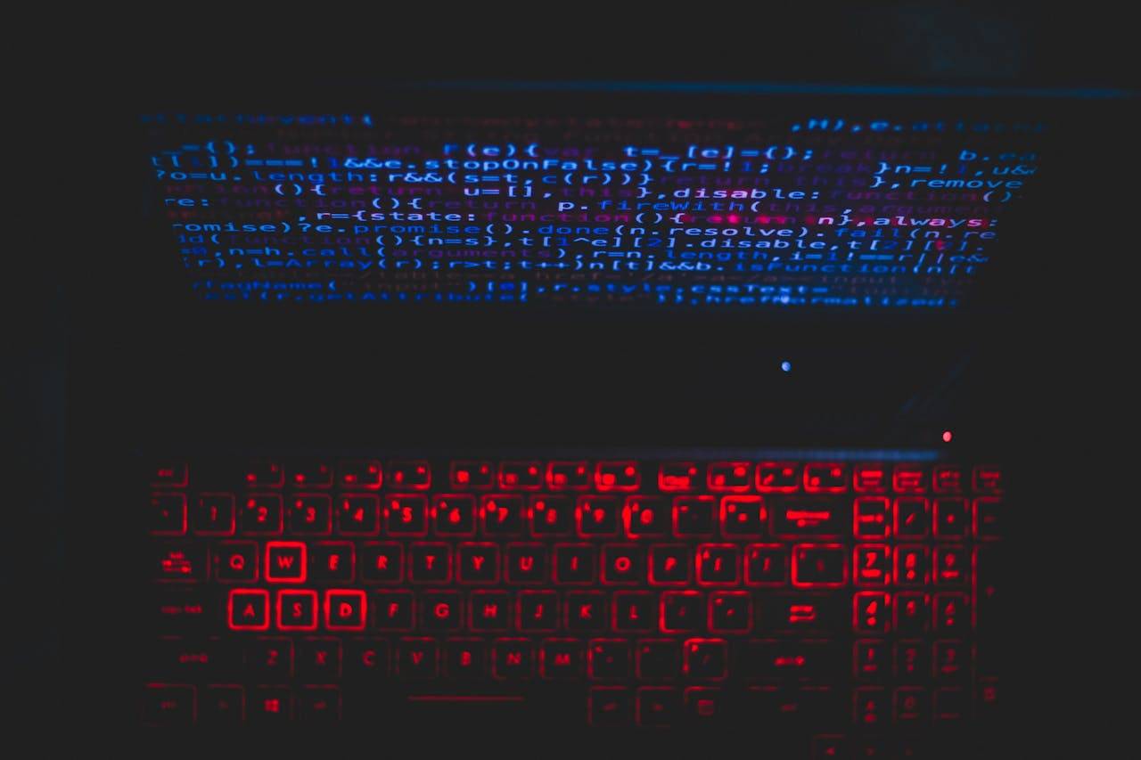 Close-up of a keyboard with code displayed on the screen, representing the top 10 online courses in artificial intelligence and machine learning for 2024