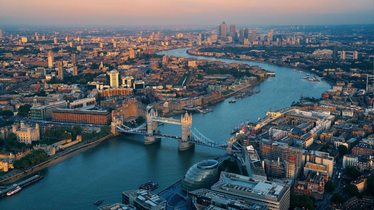 Aerial view of London, illustrating the top factors driving property price growth and real estate market trends