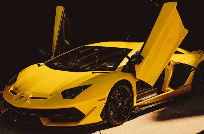 A yellow sports car with doors open, symbolizing car loans and financing options.