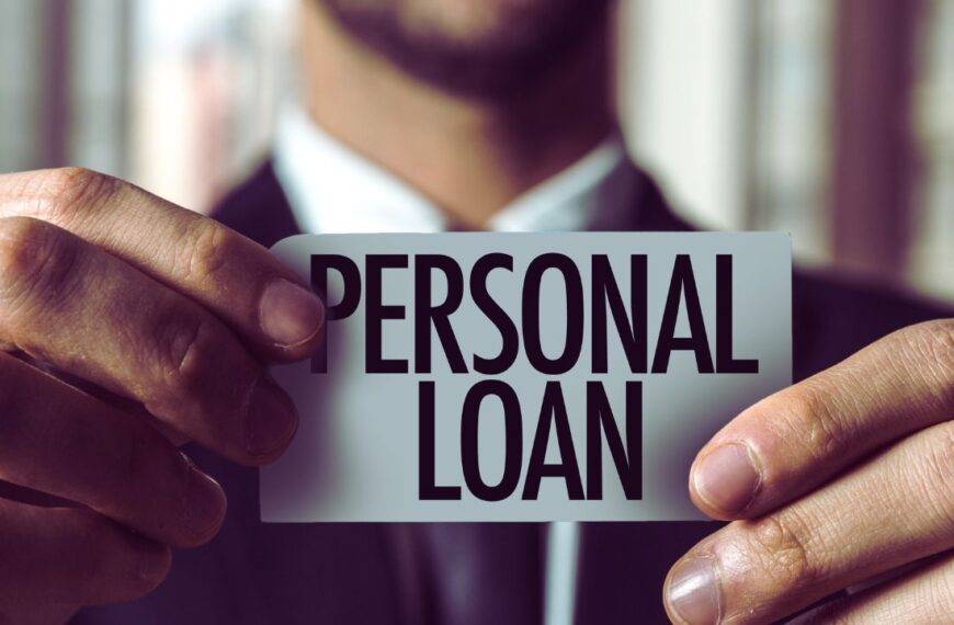 A man holding a card with the words "Personal Loan," illustrating steps to pre-qualify for personal loans