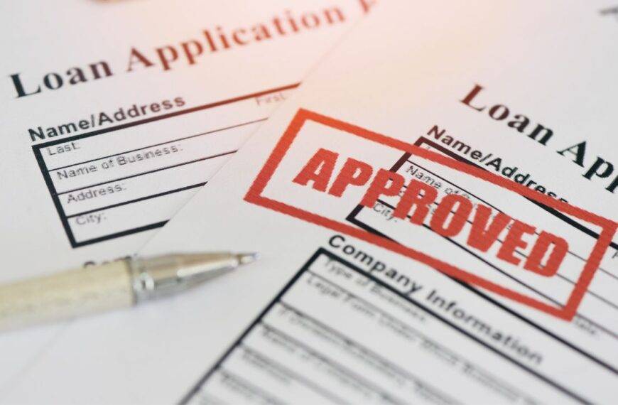 Loan application form with "Approved" stamp