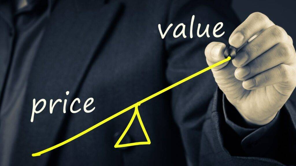 A chart comparing price and value with a balancing scale, representing rising car insurance rates in the UK